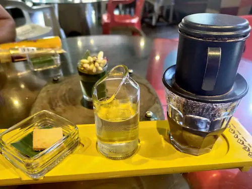 photo of coffee and water that we order at local coffee shop
