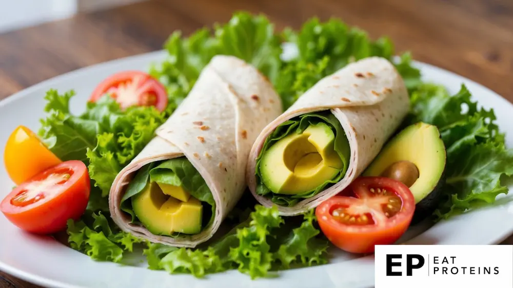 A colorful avocado and turkey wrap surrounded by fresh lettuce, tomatoes, and other low-residue diet ingredients on a clean, white plate