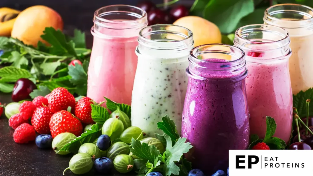 A table filled with colorful berries, and various juice bottles