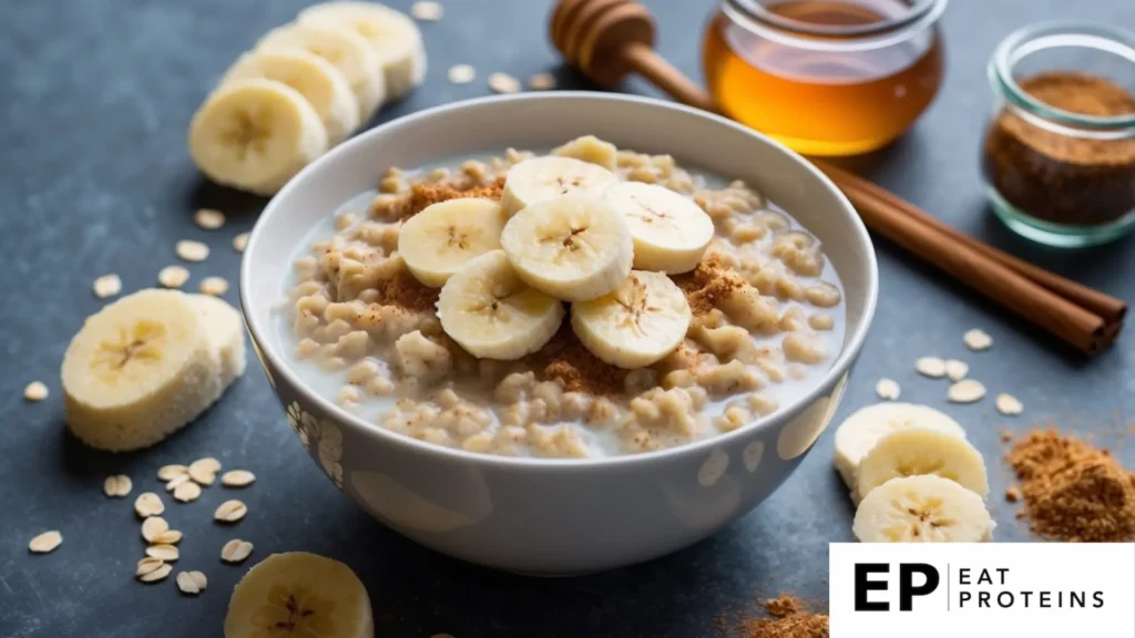 A bowl of oatmeal topped with sliced bananas, surrounded by ingredients like honey, almond milk, and cinnamon