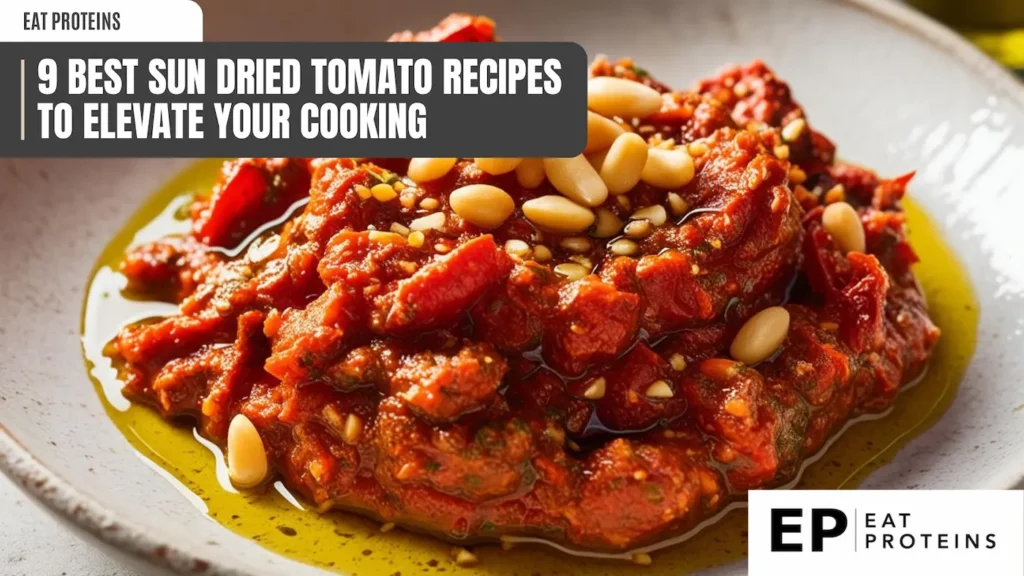 a close-up of sun-dried tomato pesto on a speckled plate. the pesto is a deep red color with visible pieces of tomato and pine nuts. a banner at the top reads "9 best sun-dried tomato recipes to elevate your cooking." the "eat proteins" logo is in the top left and bottom right corners. a pool of olive oil surrounds the pesto